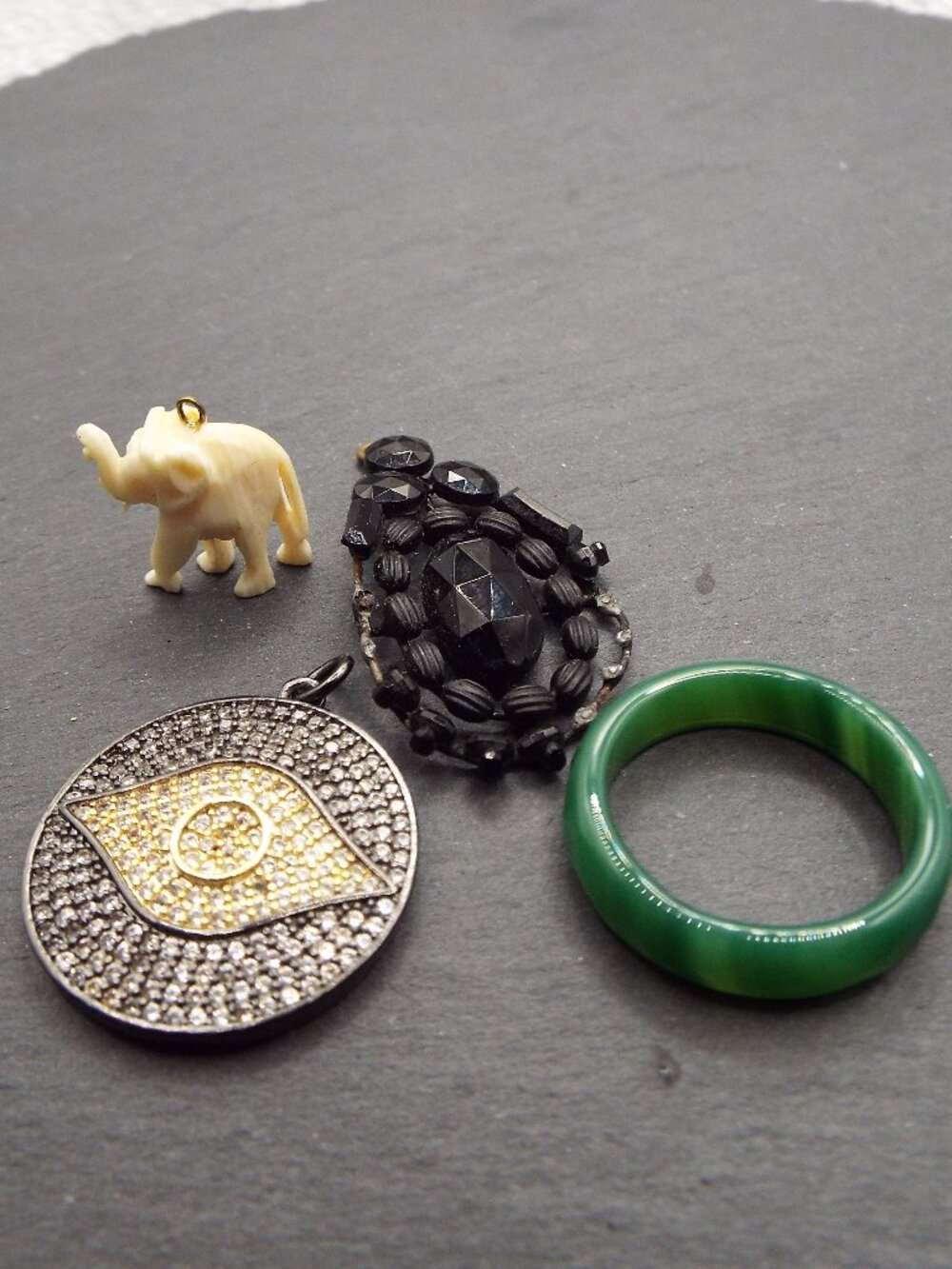 ANTIQUE BITS AND BOBS MOURNING FRENCH JET, EVIL EYE, JADE RING, ELEPHANT LOT 42